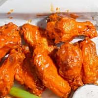 6 - Buffalo Chicken Wings · Classic bone-in wings oven- baked, cooked to order perfectly crisp, tossed with your choice ...