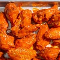 12 - Buffalo Chicken Wings · Classic bone-in wings oven- baked, cooked to order perfectly crisp, tossed with your choice ...