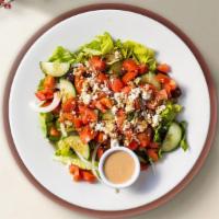 Raspberry Pecan Salad · Lettuce, Chicken, Mandarin Oranges, Pecans, Feta & Raspberry Vinaigrette.
