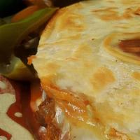 Penny · A flour tortilla with your choice of meat with cheese, heated on a comal and served with our...
