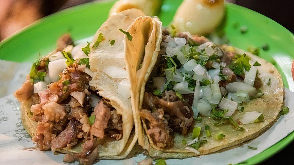 Taco · A traditional Mexican dish consisting of a small hand-sized corn or flour tortilla topped with a filling. The tortilla is then folded around the filling and eaten by hand.