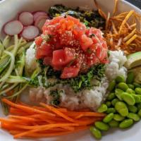 Tuna Poke Bowl · Citrus soy marinated tuna, seasoned rice, sliced kale, sriracha wonton crisps, edamame, cucu...