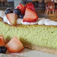 Matcha Green Tea Cheesecake · Saltine cracker crust, whipped cream, macerated berries (Vegetarian)
