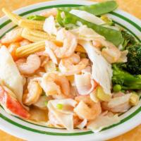 Seafood Delight · Seafood combination of jumbo shrimp, scallop, crab meat with special with white sauce.