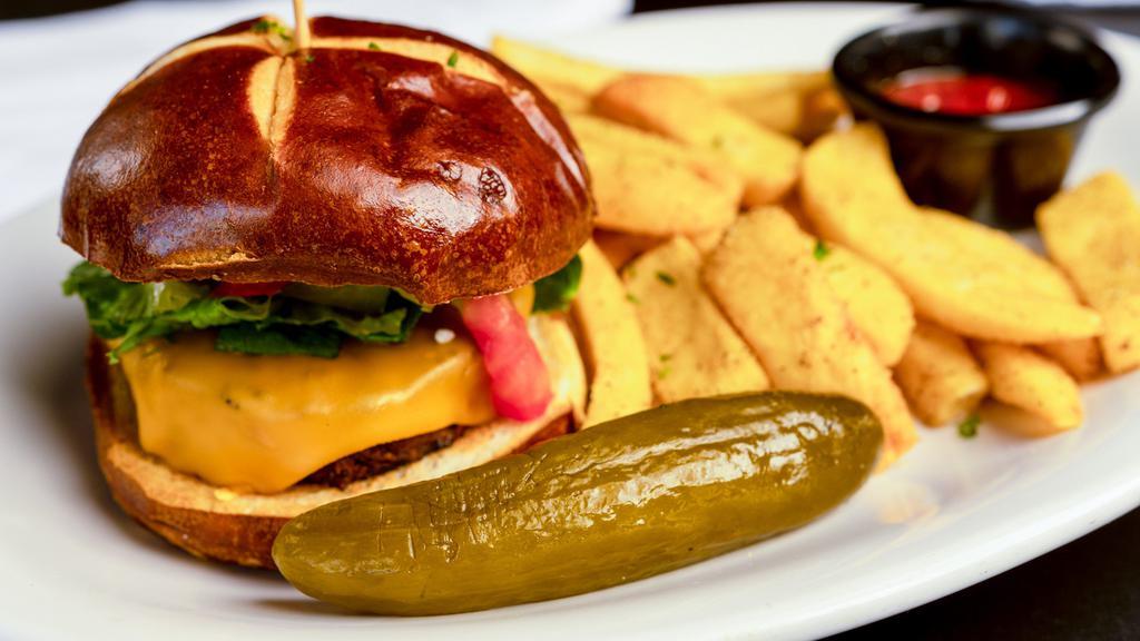 Bbq Burger · Beyond Meat burger served on a pretzel bun with Daiya Vegan Provolone, topped with romaine, tomato, onion and jalapeno . Served with a pickle and side