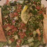 Tabouleh · Vegan, Vegetarian. A popular mediterranean salad with romaine lettuce, bulgur wheat, parsley...