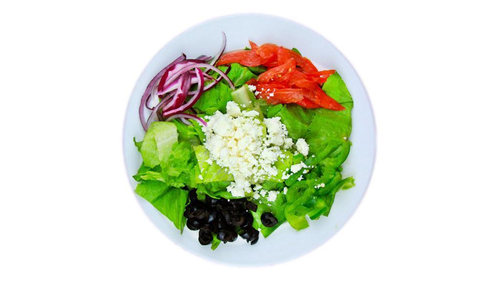 Side Greek Salad · Crumbled feta, black olives, tomatoes, red onions, green peppers tossed over crisp lettuce.