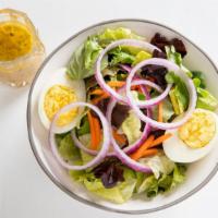 Salad De Marcory  · Vegetarian. Served with a homemade vinaigrette and eggs.