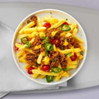 Chili Cheez Fries · Idaho potato fries cooked until golden brown and garnished with vegan American cheez sauce a...