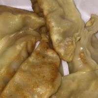  Fried Dumplings (8 Pieces) · 