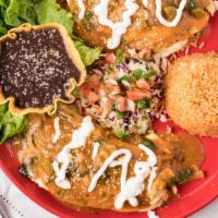 32 Chile Relleno · With guacamole and the choice of warm corn or flour tortilla.