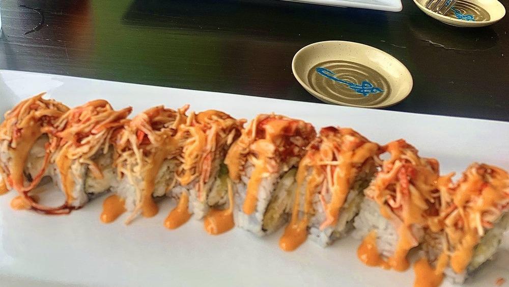 Chinggis Khan Roll · Crunchy, crab, topped with salmon, avocado, and spicy mayonnaise/ponzu sauce.