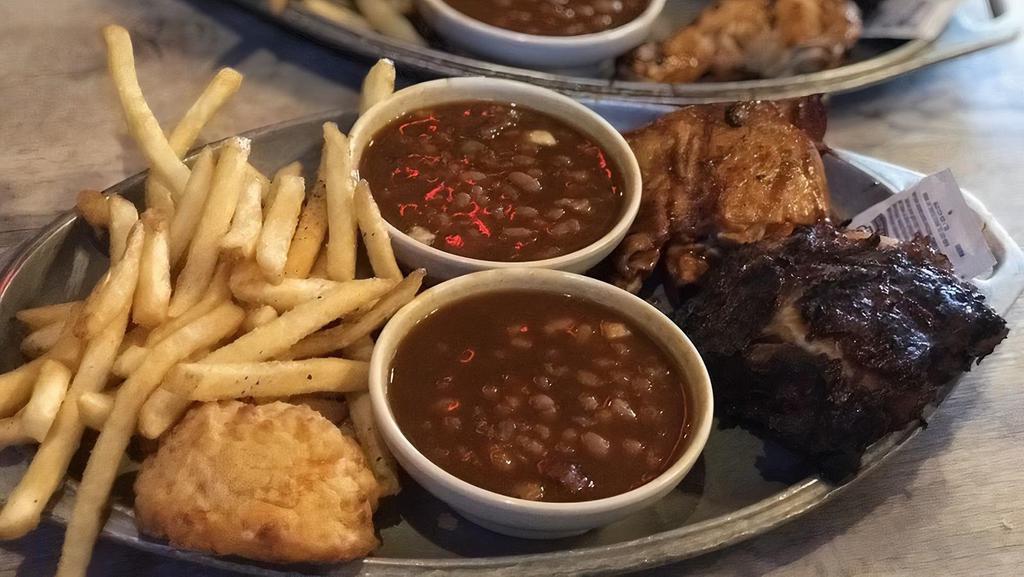 Rib & Chicken Fingers · Our Famous Ribs served with our delicious hand battered chicken tenders with French fries, tangy baked beans, country gravy and BQ Sauce.