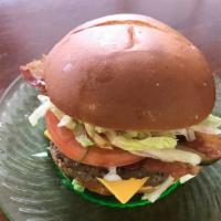 Hamburger Or Cheeseburger Combo · Hamburger with mayo, ketchup, mustard, lettuce, tomato, onion and pickle on a soft potato ro...