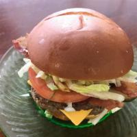 Hamburger Or Cheeseburger · Hamburger with mayo, ketchup, mustard, lettuce, tomato, onion and pickle on a soft potato ro...