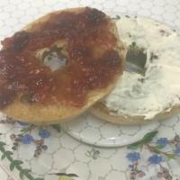 Toasted Bagel · Toasted Split Bagel. Served with Butter, Jam and Cream Cheese