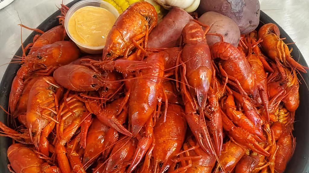 10 Lb Special · 10 lbs of the world's greatest hot tasty boiled crawfish with 4 potatoes, 2 corn, 1 sausage, and a crawfish dipping sauce