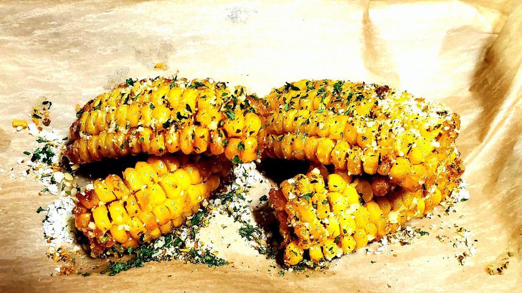 Cajun Street Corn  · Flash fried crawfish corn buttered and covered w/ Parmesan Romano cheese and mojito-lime seasoning.