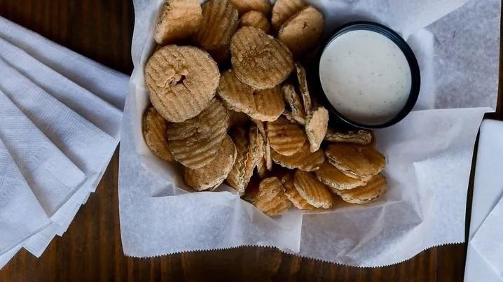 Skinny Pickles · A hefty portion of dill pickle chips served with ranch for dipping. Add fried jalapeño for make it a beer basket for an additional charge.