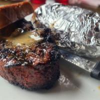 Filet · 8 oz filet served with a house salad and your choice of 1 side.add bleu cheese sauce for an ...