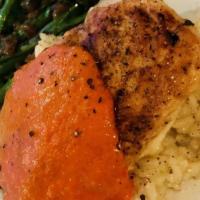 Stuffed Chicken · Grilled chicken breast stuffed with spinach & mozzarella in a roasted red pepper sauce over ...