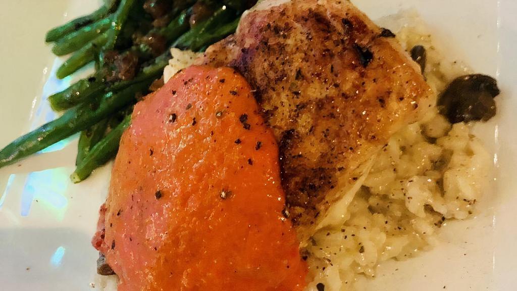 Stuffed Chicken · Grilled chicken breast stuffed with spinach & mozzarella in a roasted red pepper sauce over portabella risotto.