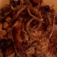 Pork Chop · Center cut, thick pork chop served over sautéed Brussel sprouts & chickpeas with a brandied ...
