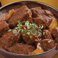 Lamb Rogan Josh · Lamb cooked with Kashmiri herbs and spices