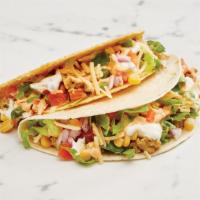 Tacos · Choose from either a crunchy taco shell or soft flour tortilla with your choice of slow-cook...