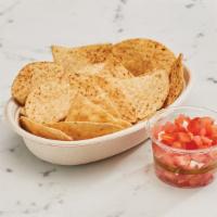 Chips & Salsa · Crispy corn chips with a side of tomato salsa
