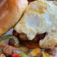 Hangover Burger  · Angus Beef, Bacon, Egg and Cheese . Served with Seasoned Potatoes