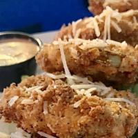 Fried Green Tomatoes · A Southern classic. Freshly cut green tomatoes lightly breaded and fried. Served with homema...