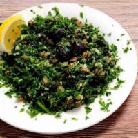 Tabouli Salad · Vegetarian. Cracked wheat mixed with parsley, mint, green onion, and tomato. Seasoned with o...