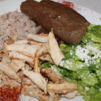 Combo Plate · Sliced chicken shawarma and beef and lamb gyro meat. Served with feta cheese salad, rice, hu...