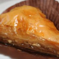 Baklava · (1 pc.) A rich and sweet dessert pastry. Filled with chopped nuts and sweetened with honey.