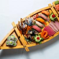 *Boat For Two  · Five kinds of sashimi, seven nigiri and a California roll.