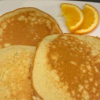 Pancakes · Griddled pancake topped with butter and served with warm syrup. 1300 Calories