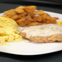 Country Fried Steak & Eggs · Country fried steak, topped with sausage gravy, served with two eggs any style and breakfast...