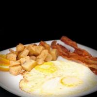 Innjoyable Breakfast · Two eggs any style served with breakfast potatoes, choice of meat and toast. 870 Calories