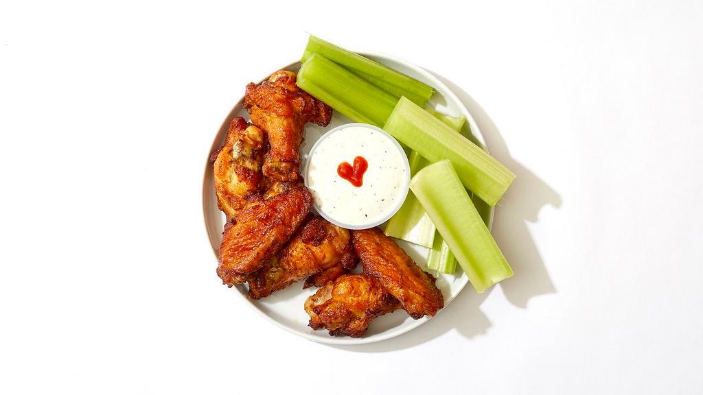 Wild Child Wings · Six crispy wings with your choice of sauce.