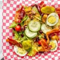 Side Salad · Served With Cucumbers, Tomatoes, Cheese, Craisins, Boiled Eggs, Bread and Butter Pickles, & ...