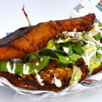 Pambazos · Potato with mexican sausage. Served with lettuce, tomato, avocado, cheese, sour cream and ja...