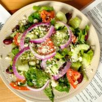 Greek Salad · Romaine lettuce topped with feta cheese, kalamata olives, tomatoes, cucmbers & red onions. D...