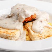 Aw Chicken & Biscuits · Chicken fried chicken over scrambled eggs and biscuits, covered with sausage gravy.