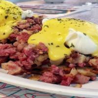 Irelands Favorite · A split buttermilk biscuit, topped with house made corned beef hash, poached eggs and hollan...