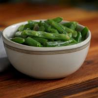 Green Beans (Individual) · Homestyle green beans slow-simmered with a hint of pork seasoning.