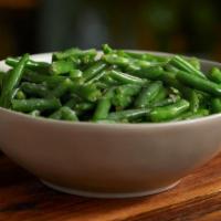 Green Beans (Large) · Homestyle green beans slow-simmered with a hint of pork seasoning.