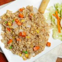 Thai Fried Rice · Traditional Thai fried rice with egg, tomatoes, onions, scallions, peas, carrots, and cilant...