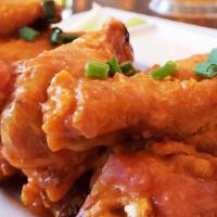 Wings · Ten crispy fried wings. Choice of buffalo, teriyaki, or IPA-BBQ sauce. Served with ranch or ...