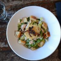 Caesar Salad · Romaine hearts, garlic croutons, parmesan crisps and crispy shallots served with caesar dres...